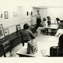 Nancy Hart teaching botanical art class in classroom