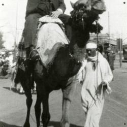 Joy Morton riding camel in Egypt
