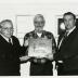 William Buckingham presenting a National Centennial Award to Web Crowley and George Ware