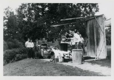 Fish Boil: Dick Wason cooking fish outdoors