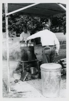 Fish Boil: Dick Wason and Tony Tyznik cooking fish outdoors