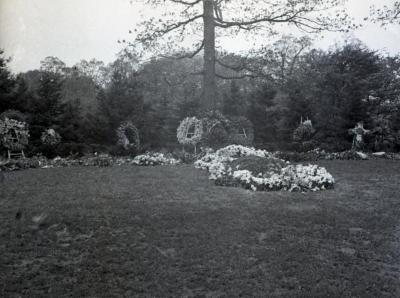 Joy Morton burial plot with flowers and floral stands