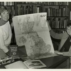Karla Patterson (left) and Carol Doty showing map of Britain in the Sterling Morton Library