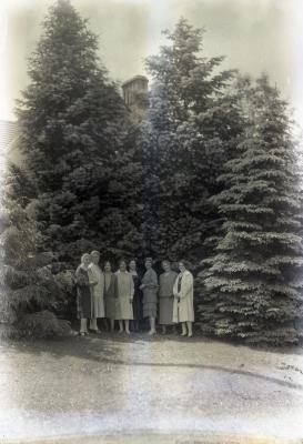 Margaret Gray Morton east of residence with seven women