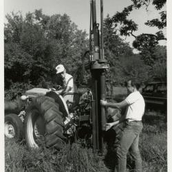 Gary Watson (on tractor) and Mike Spravka in Round Meadow gathering soil samples to study roots of white oaks in amended soils, Giddings Rig