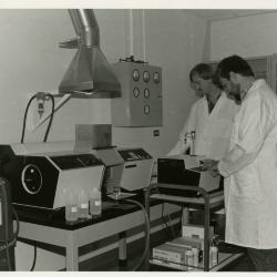 Pat Kelsey (left) and Rick Hootman using the Atomic Absorption Spectrophotometer to test for heavy metal and salt contaminants in the lab