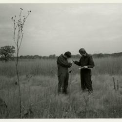 Pat Kelsey (left) and Rick Hootman soil testing in the prairie