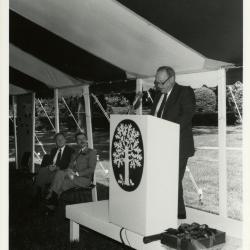 Tony Tyznik Retirement Party in tent - Charles Haffner addressing guests from podium - (Seated L to R): Tony Tyznik, Gerry Donnelly