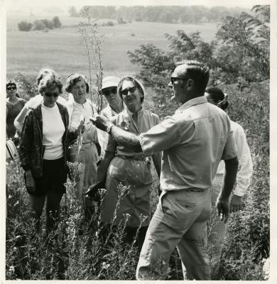 Ray Schulenberg and students in the Schulenberg Prairie