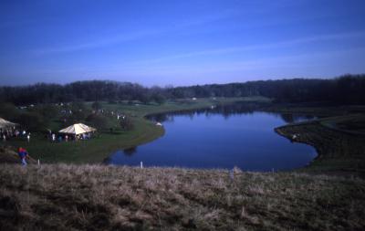 View of Crabapple Lake from on top of berm during Earth Day celebration and berm planting