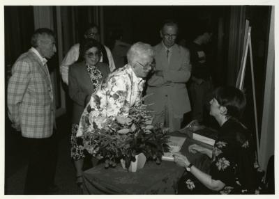 Registration at Swink-Wilhelm book signing at Thornhill - Nancy Hart Stieber seated, George Hickman standing to the right