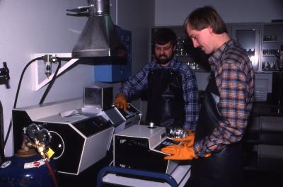 Pat Kelsey and Rick Hootman working with equipment in soils lab