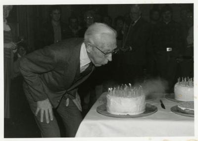 Clarence E. Godshalk's 90th birthday party, blowing out the candles