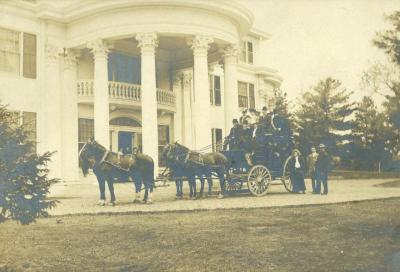 Four horse coach and people in front of Arbor Lodge, after 1903 remodeling
