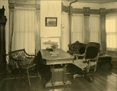 Arbor Lodge album: interior of house, room with table and chairs