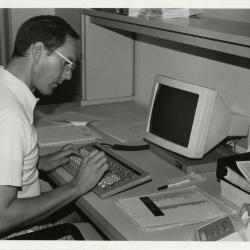 Ed Hedborn at new computer for the Collections department