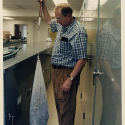 Dr. William Hess weighing anti-cancer plants