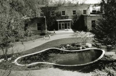 Administration Building front entrance and lily pond, aerial view