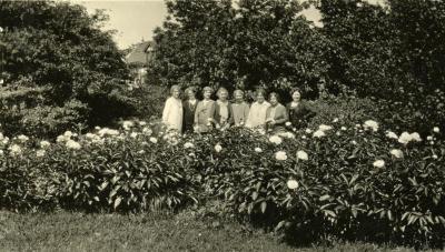 Mrs. Joy Morton and friends, in gardens at Thornhill residence