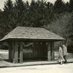Two people approaching Arboretum Map Station