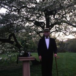 Twilight Tree Walk, Craig Johnson dressed as Joy Morton, standing next to Morton Salt canister on stand