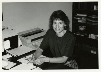 Linda Kovach at desk