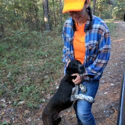 Megan Schrock with dog, Mississippi