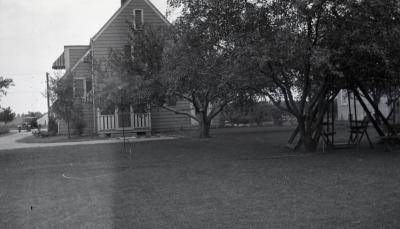 Propagator's house and yard at South Farm, rear view