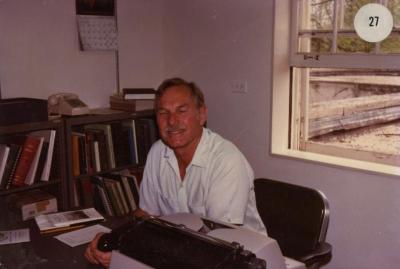 Ray Schulenberg at desk in office