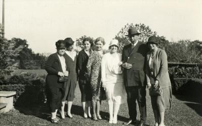 Joy Morton September 27, 1930 photo album: Joy Morton standing with group of women