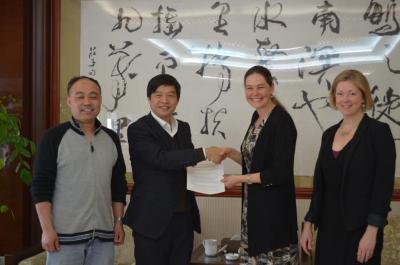 Nicole Cavender and Murphy Westwood meeting with colleagues from the Beijing Botanical Garden in China