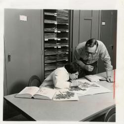 Ray Schulenberg with Kathy Ciolac studying specimens in Herbarium 