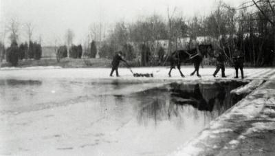 Percheron horse and three men on Lake Marmo making ice at Lisle Farms
