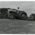 Tony Tyznik driving tractor over landscape