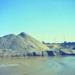 Arbor Lake excavation, mounds of dirt to the left of partially filled lake