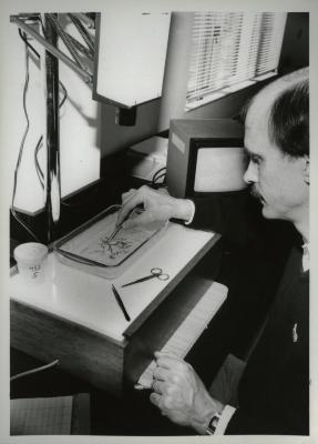 Dr. Gary Watson working in lab