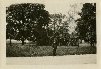Future site of Clarence Godshalk's first Arboretum house (sketched in behind trees), Emil in foreground