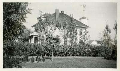 Original South Farm house with high water tank and windmill, built 1917, torn down 1930
