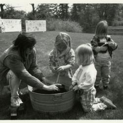 Arbor Day/Week, Marsha Davis planting with children