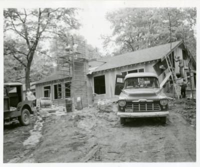 Clarence Godshalk residence, construction, back exterior, with vehicles and men working