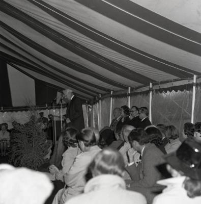 Arbor Day Centennial, afternoon program, Clarence Godshalk at podium speaking to guests seated in tent