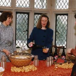 George Ware Retirement Party in Founders Room - Rita Hassert pouring plum wine with Susan Klatt (left)
