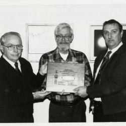 William Buckingham presenting a National Centennial Award to Web Crowley and George Ware