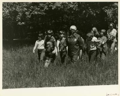 Morton Arboretum Guide, Marjorie Walls, with children in the prairie