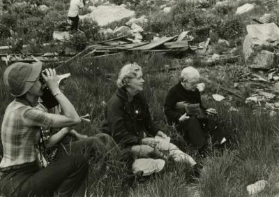 Elizabeth "Sody" Zimmerman seated in grass with other people
