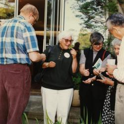 Green Nature, Human Nature book signing in Sterling Morton Library, group of guests in conversation in the May T. Watts Reading Garden