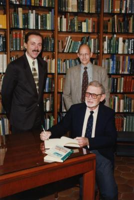 Green Nature, Human Nature book signing in Sterling Morton Library, Gerry Donnelly and Michael Stieber standing, Charles Lewis seated