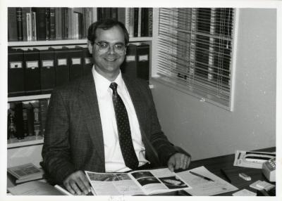 Closeup of Bill Carvell at desk