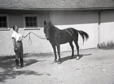 Sterling Morton's horse Diana with female trainer holding reins