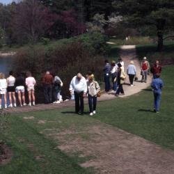 Visitors along path around Meadow Lake at Arborfest